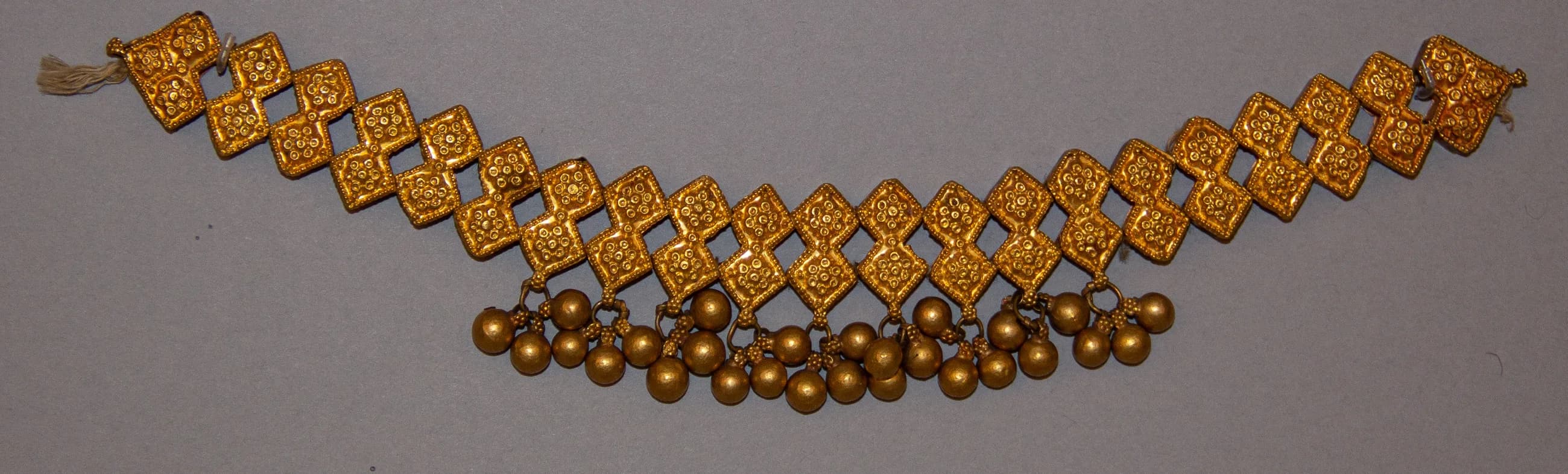 Gold temple galaband necklace